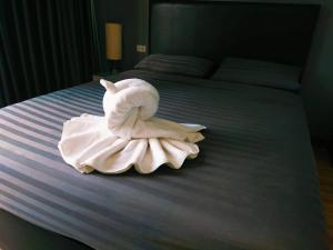 Wixky hotel客房内的一张或多张床位