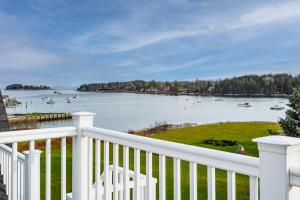 a view of a large body of water with boats in it at East Wind Inn & Suites in Tenants Harbor
