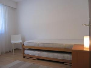 Tempat tidur dalam kamar di Apartment Merises