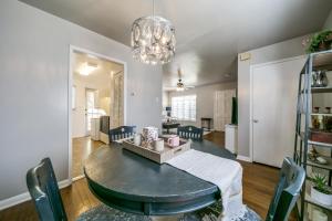 a dining room and living room with a table and chairs at Historical Home in Iconic Alamo Heights - Sky view in San Antonio