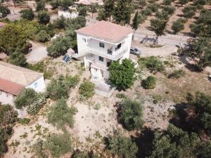 an overhead view of a large white house at Anastassia EG in Koroni