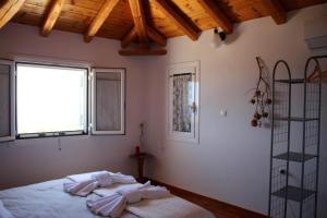 Postel nebo postele na pokoji v ubytování Alexia + 35 fotografií