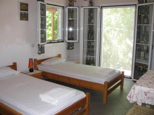 A bed or beds in a room at Nikos 9