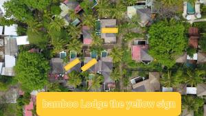 an overhead view of a villa with trees and buildings at Bamboo Lodge 2 in Gili Trawangan