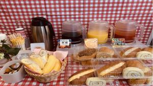a table with a bunch of different types of bread at Toyoko Inn Tokyo Kamata No 1 in Tokyo