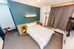 The Jade Hotel房間的床
