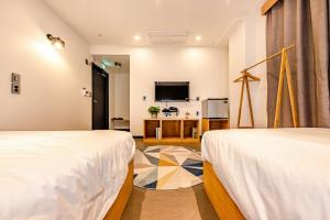The Jade Hotel房間的床