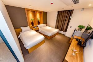 The Jade Hotel房間的床