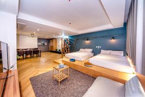 The Jade Hotel房間的床 +36 張相片