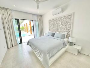 Postel nebo postele na pokoji v ubytování Blossom Villa - Lamai, Koh Samui - Entire Villa