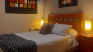 Postel nebo postele na pokoji v ubytování Hostal del Aguila + 37 fotografií