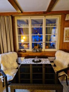 Posezení v ubytování Chalet Gotthelf Gartenstudio, Ferien mit Hund