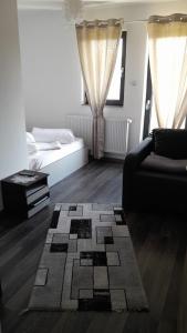 Giường trong phòng chung tại Apartamente Ambrus E Studio 21 Praid
