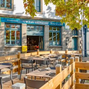 Reštaurácia alebo iné gastronomické zariadenie v ubytovaní Les apparts de Léon