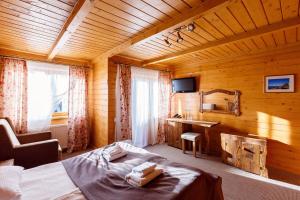 Posteľ alebo postele v izbe v ubytovaní GORGANY resort & SPA