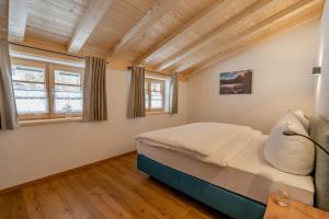 Кровать или кровати в номере Waldgut