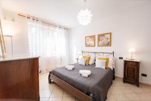 Posteľ alebo postele v izbe v ubytovaní Liala Home