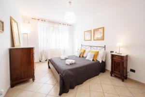 Posteľ alebo postele v izbe v ubytovaní Liala Home