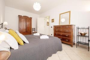 Posteľ alebo postele v izbe v ubytovaní Liala Home