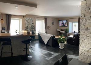 Televízia a/alebo spoločenská miestnosť v ubytovaní Bel appartement 115 m2 emplacement idéal