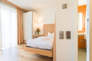 Postel nebo postele na pokoji v ubytování Seehotel Rheinsberg