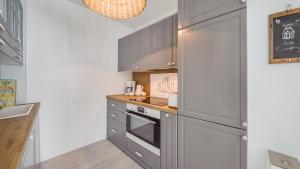Kuchyňa alebo kuchynka v ubytovaní Apartamenty Sun & Snow Playa Baltis z sauną