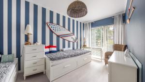 Posteľ alebo postele v izbe v ubytovaní Apartamenty Sun & Snow Playa Baltis z sauną