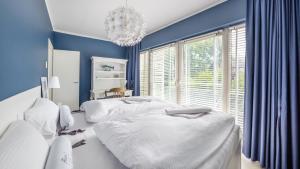 Posteľ alebo postele v izbe v ubytovaní Apartamenty Sun & Snow Playa Baltis z sauną