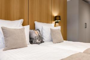 Postel nebo postele na pokoji v ubytování Victoria Interpark Hotel