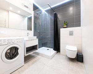 Kúpeľňa v ubytovaní DreamHouse Apartament Timone Północna Darłówko Wschodnie