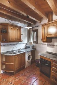 Kuchyň nebo kuchyňský kout v ubytování Casa Samarra