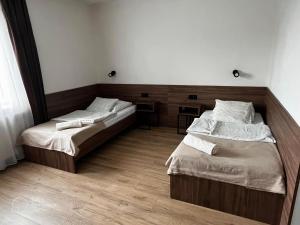 Posteľ alebo postele v izbe v ubytovaní Hotel i Restauracja „KRISTAL”