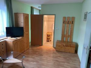 Telewizja i/lub zestaw kina domowego w obiekcie Waldrestaurant VIDA