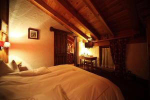 Postel nebo postele na pokoji v ubytování Eco Chalet Maison Dominique