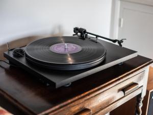 a vinyl record sitting on top of a table at Green Farm House in Cirencester