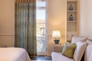 Cama ou camas em um quarto em Dorion Hotel