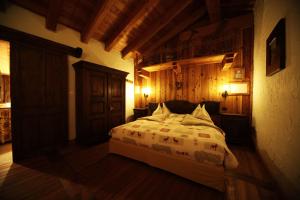 Postel nebo postele na pokoji v ubytování Eco Chalet Maison Dominique