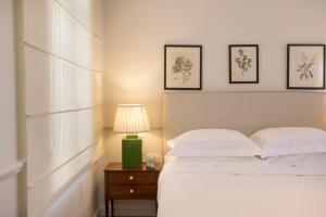 Cama ou camas em um quarto em Dorion Hotel