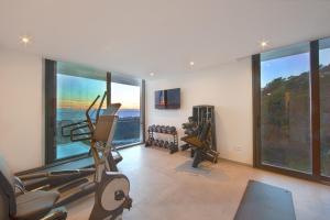 Telewizja i/lub zestaw kina domowego w obiekcie Luxury Villa Tomillo