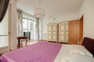 Cama o camas de una habitación en Apartments Florence Menicucci