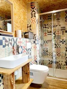 Koupelna v ubytování Une pause là-haut! + 10 fotografií