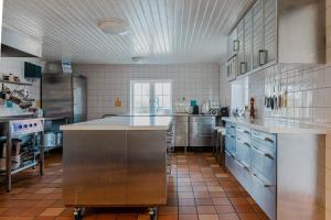 Kuchyň nebo kuchyňský kout v ubytování Lilla Sörgården + 27 fotografií