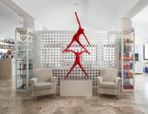 a display in a store with two chairs at Hotel Perrakis in Kipri