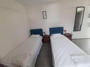 Postel nebo postele na pokoji v ubytování Emmanouela Studios