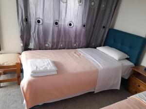 Postel nebo postele na pokoji v ubytování Emmanouela Studios