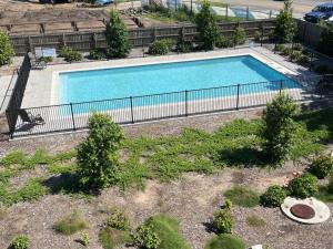 an overhead view of a swimming pool in a yard at Marina Point in Sandstone Point
