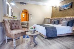 Kama o mga kama sa kuwarto sa Hotel El Habib Monastir