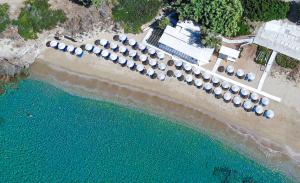 an aerial view of a beach with a bunch of umbrellas at Hotel Perrakis in Kipri