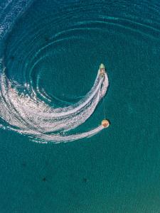 a boat in the middle of the water at Hotel Perrakis in Kipri