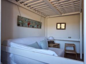 A bed or beds in a room at LA COLLINETTA Még 11 kép